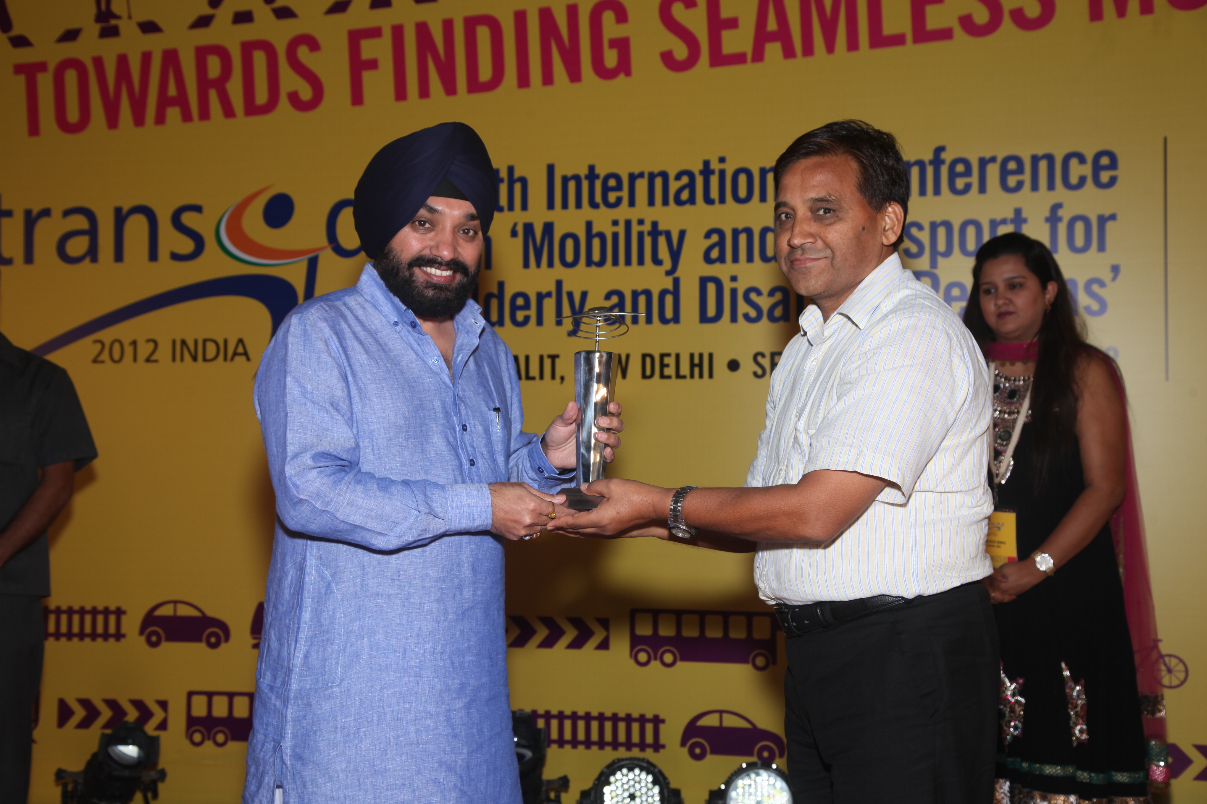 Picture of Dr. D.N. Dimri, Superintending Archaeologist, Delhi Circle of ASI, receiving the Award on behalf of ASI